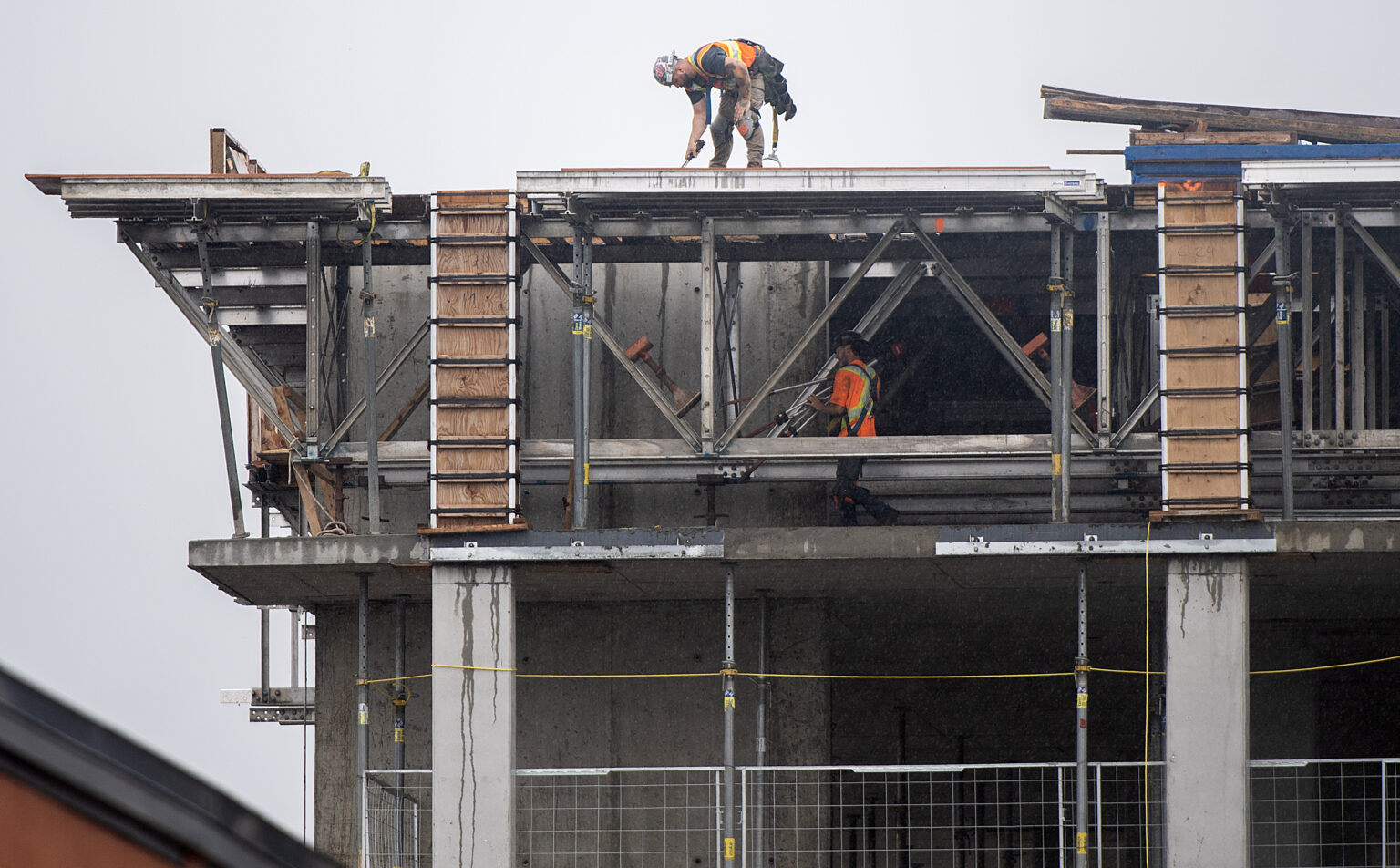 Construction workers at a new condo development in Montreal, Monday, July 10, 2023. THE CANADIAN PRESS IMAGES/Graham Hughes